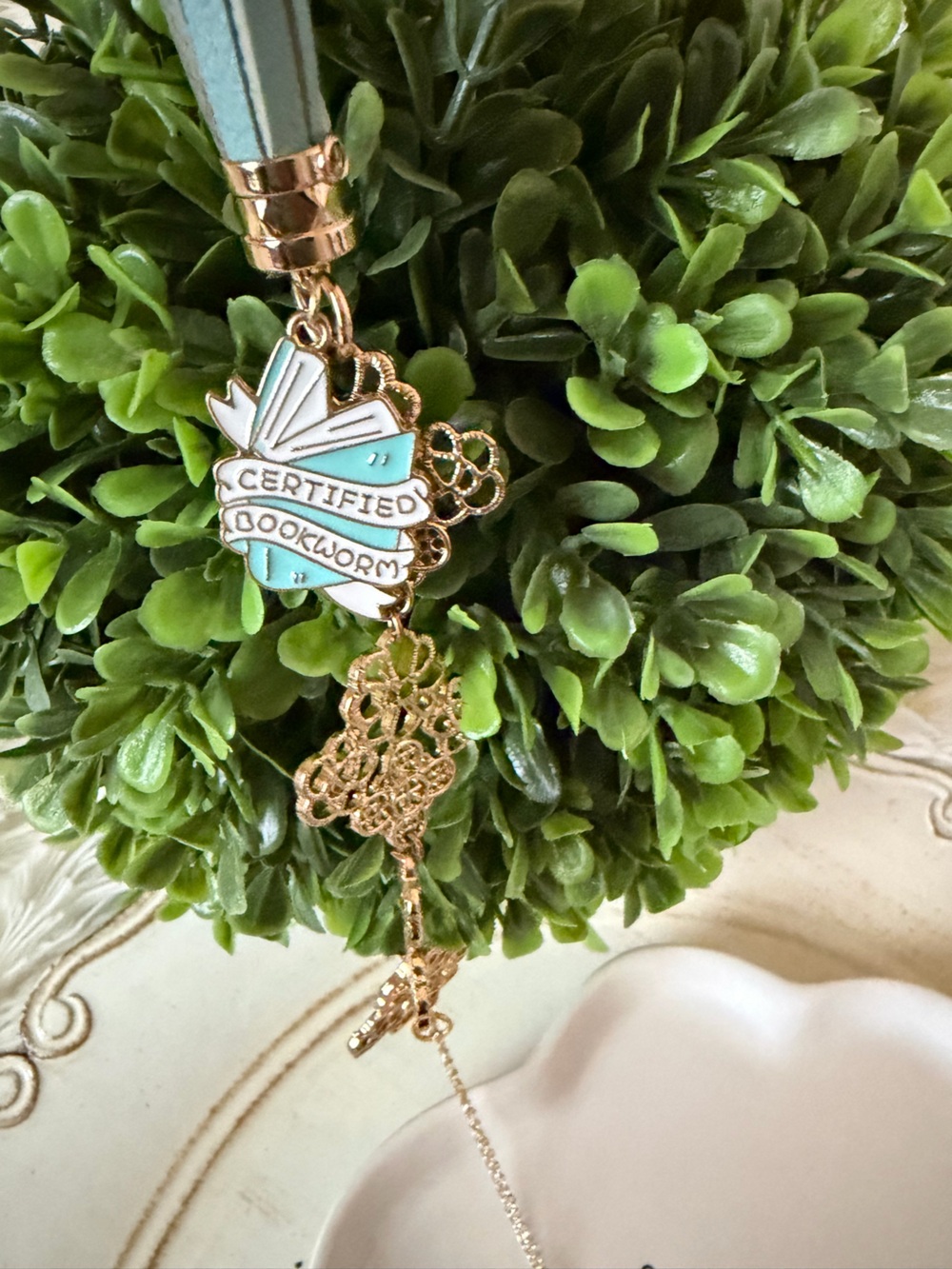 Delicate Gold tone Filigree bookmark with Light Blue Tassel Accents